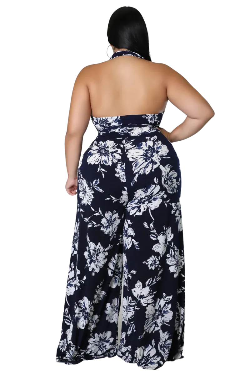 Final Sale Plus Size Faux Wrap Halter Jumpsuit with Waist Tie in Navy and White Floral Print