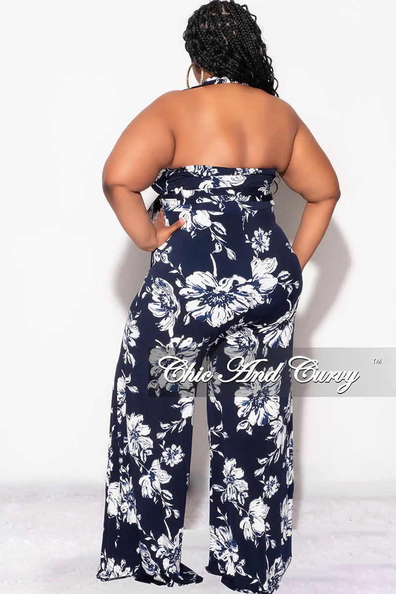 Final Sale Plus Size Faux Wrap Halter Jumpsuit with Waist Tie in Navy and White Floral Print
