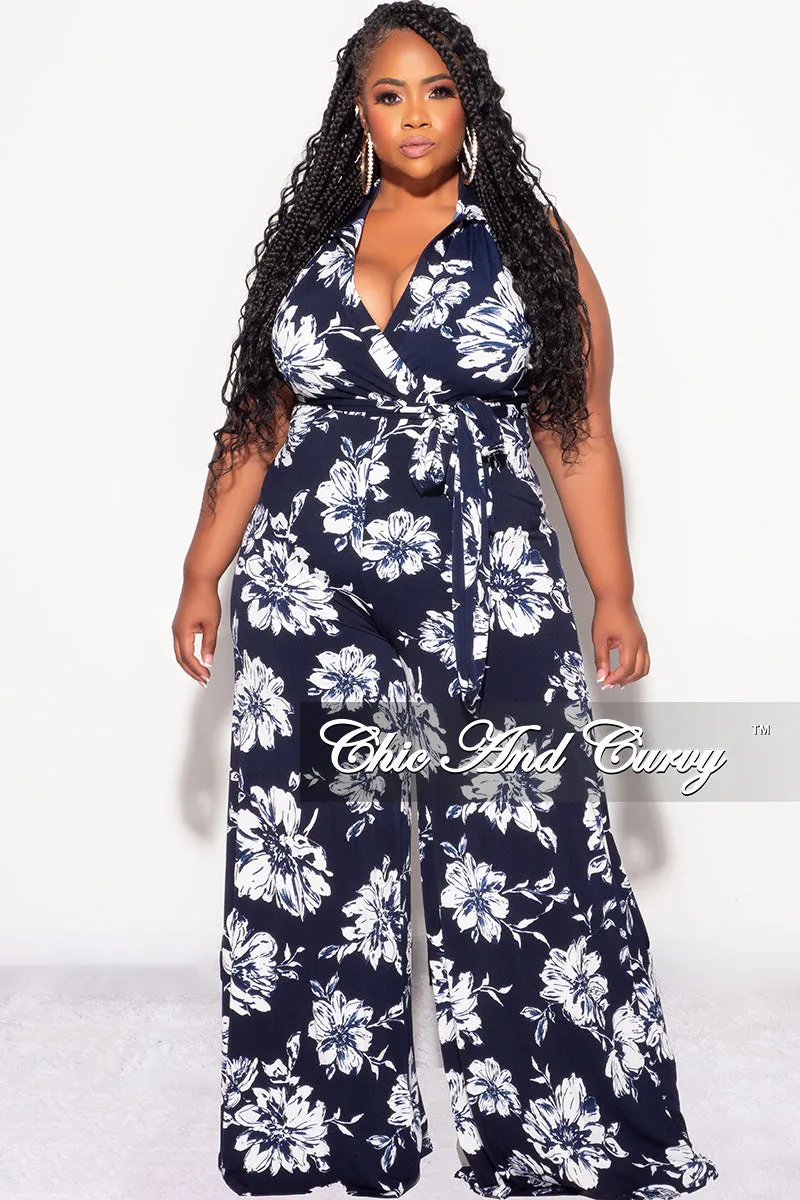 Final Sale Plus Size Faux Wrap Halter Jumpsuit with Waist Tie in Navy and White Floral Print